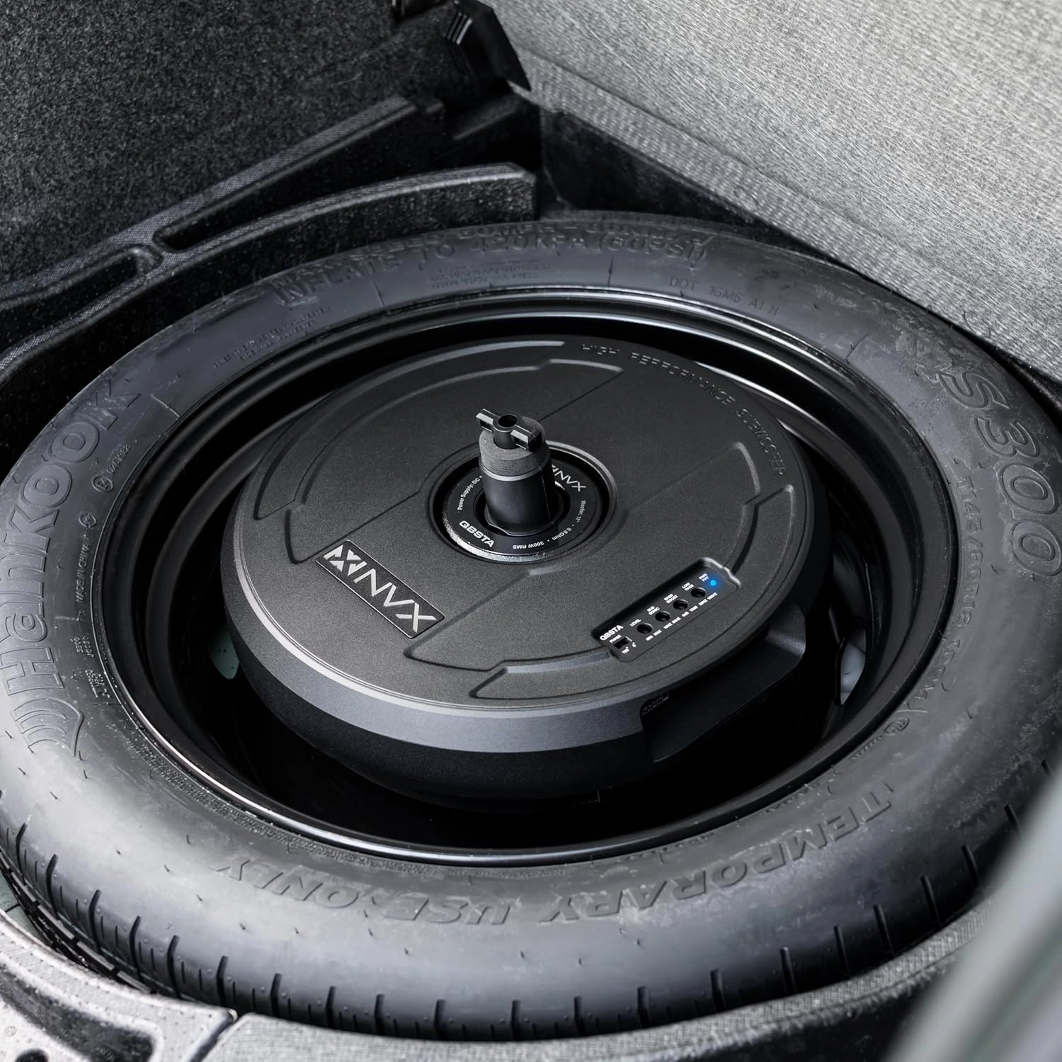 NVX QBSTA 900W Max (300W RMS) 11" Powered Spare Tire Subwoofer Box with Built-in Amp and Remote Bass Knob, Easy to Install in Cars