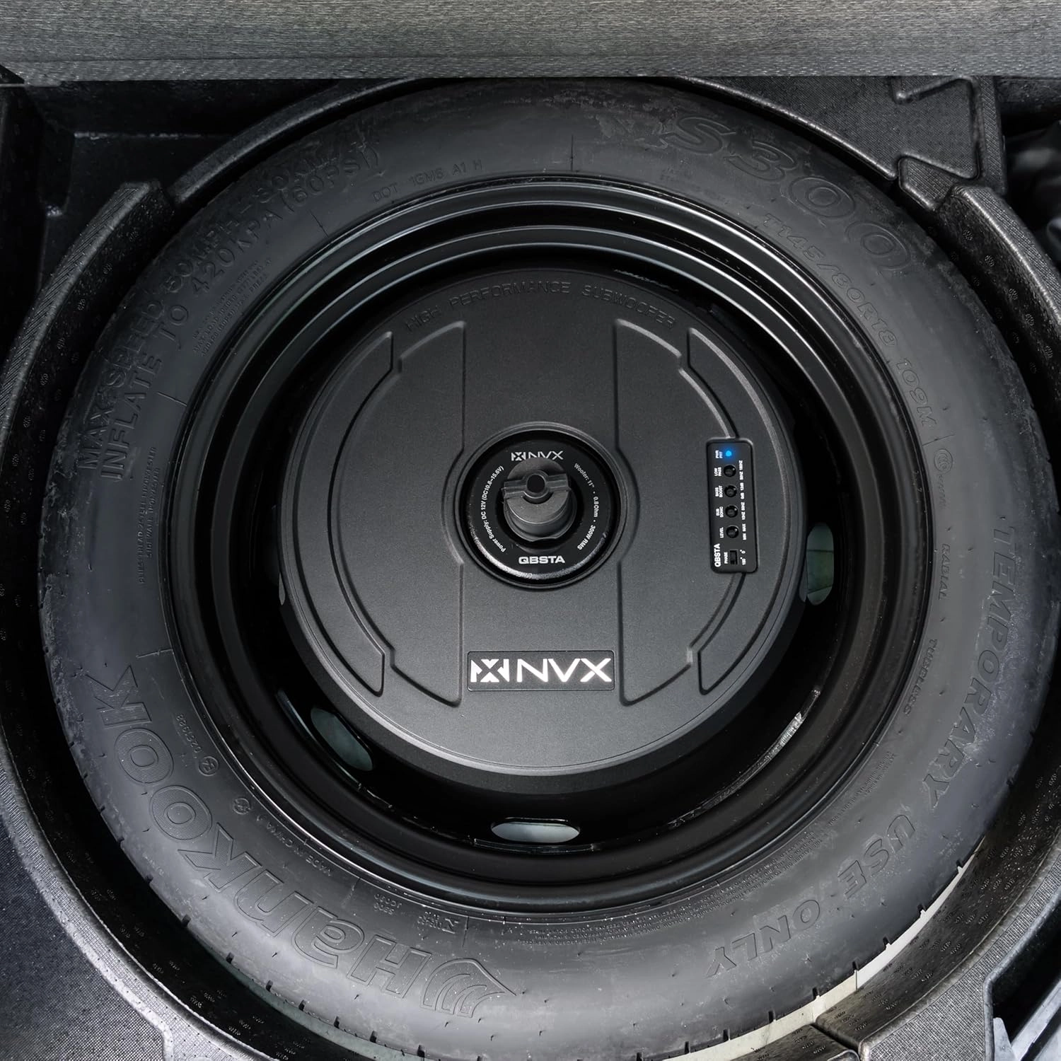 NVX QBSTA 900W Max (300W RMS) 11" Powered Spare Tire Subwoofer Box with Built-in Amp and Remote Bass Knob, Easy to Install in Cars