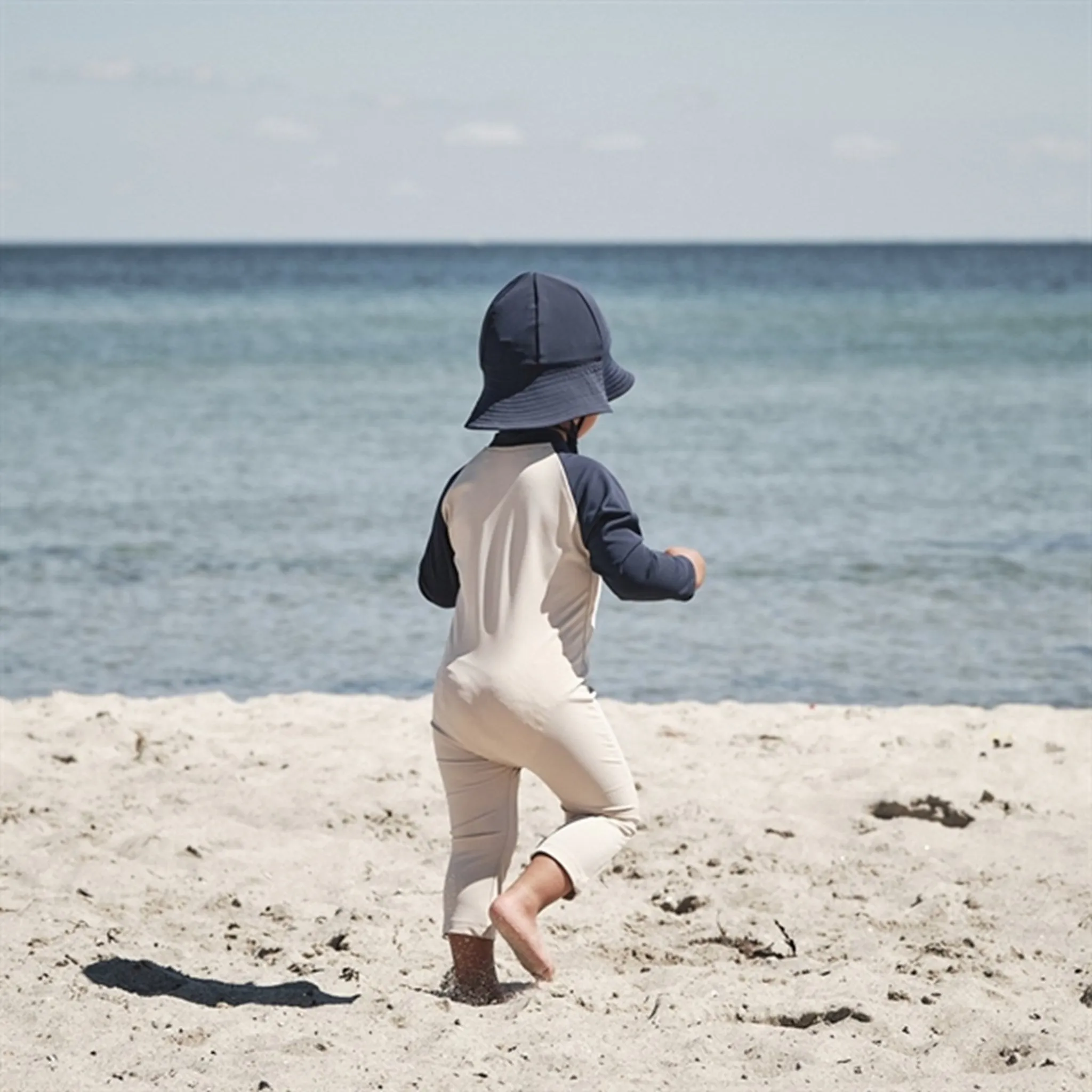 Petit Crabe Latte/Blue Multi Color Onesie with Zipper