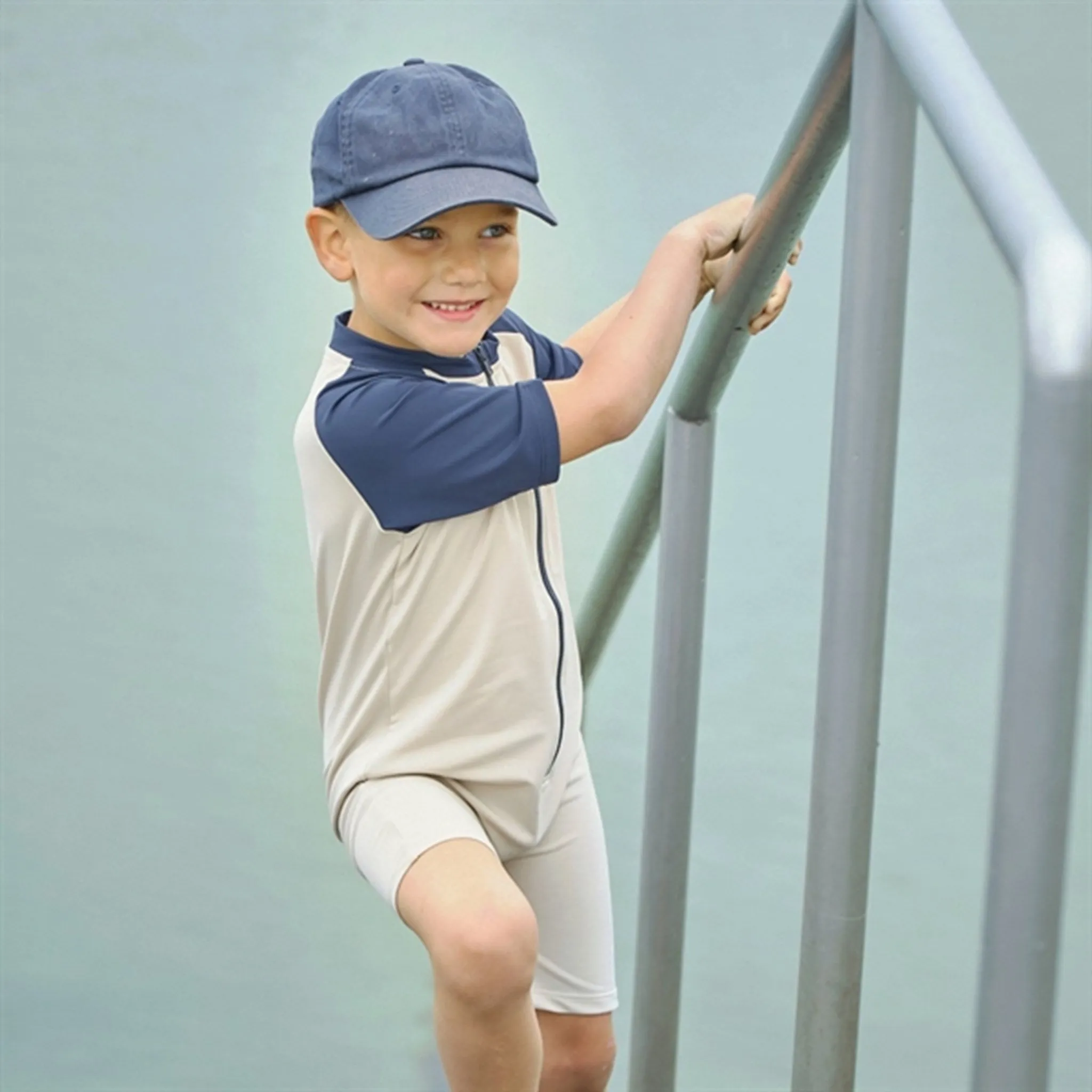 Petit Crabe Latte/Blue Multi Color Onesie with Zipper
