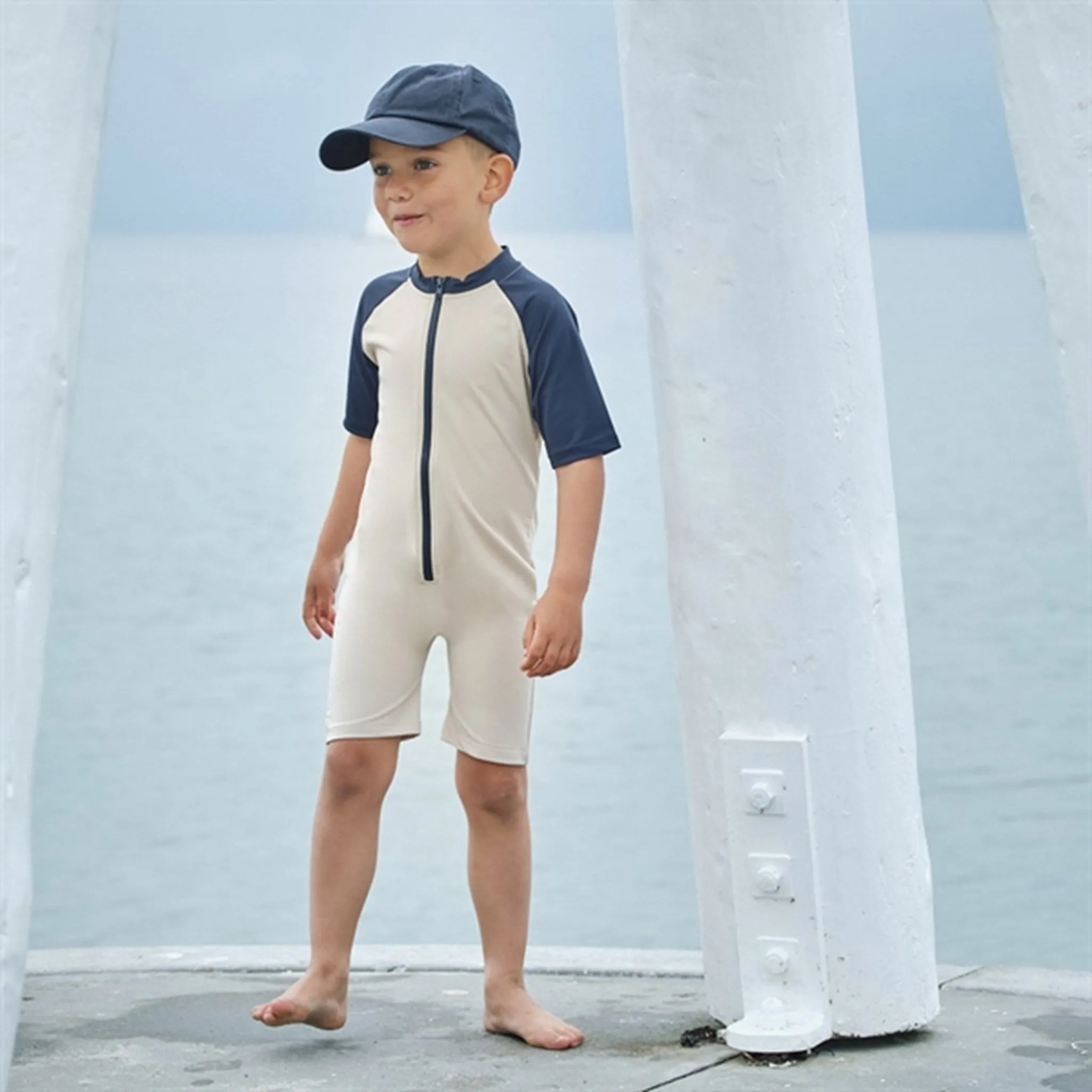 Petit Crabe Latte/Blue Multi Color Onesie with Zipper